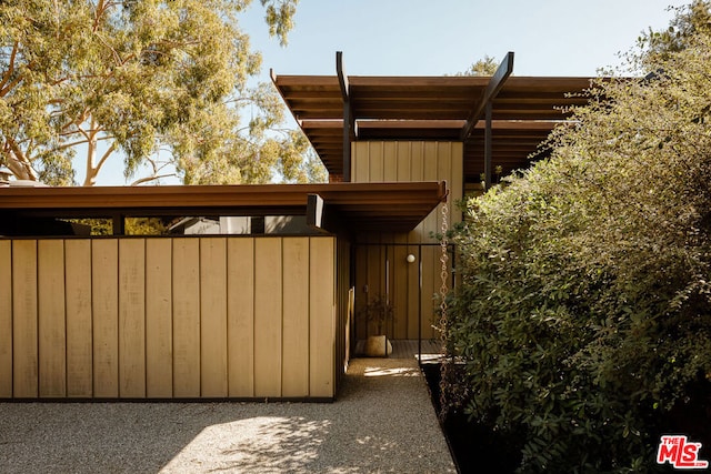 exterior space featuring a carport