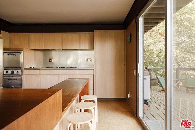 kitchen with stainless steel gas cooktop