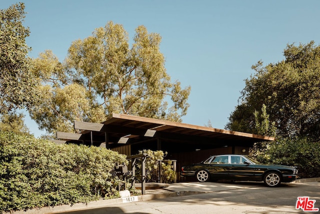 view of car parking featuring a carport