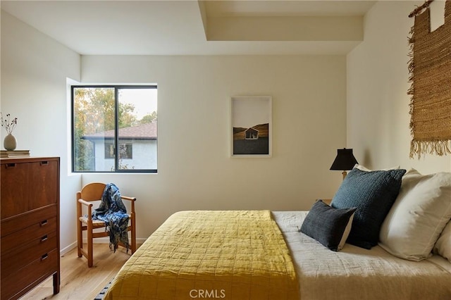 bedroom featuring wood-type flooring