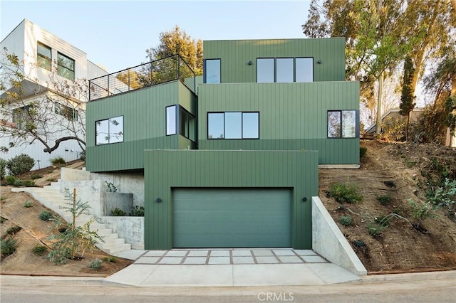 contemporary house featuring a garage