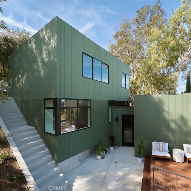 rear view of property with a patio