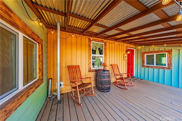 wooden terrace featuring a porch