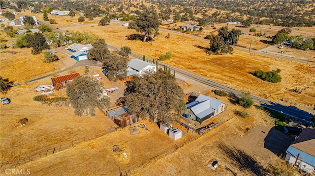 birds eye view of property featuring a rural view