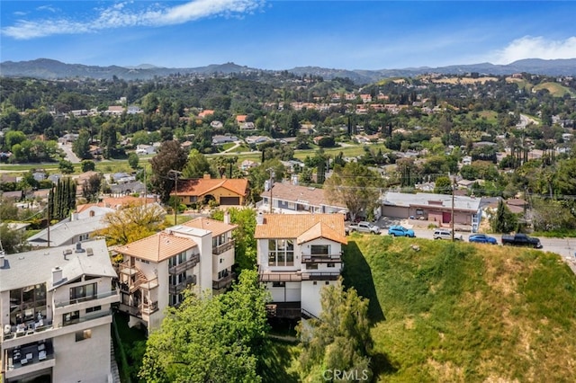 bird's eye view with a residential view and a mountain view