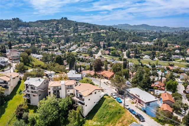 drone / aerial view with a residential view and a mountain view