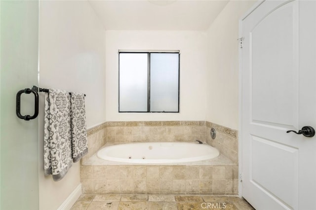 bathroom featuring a whirlpool tub