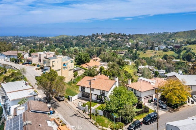 birds eye view of property with a residential view