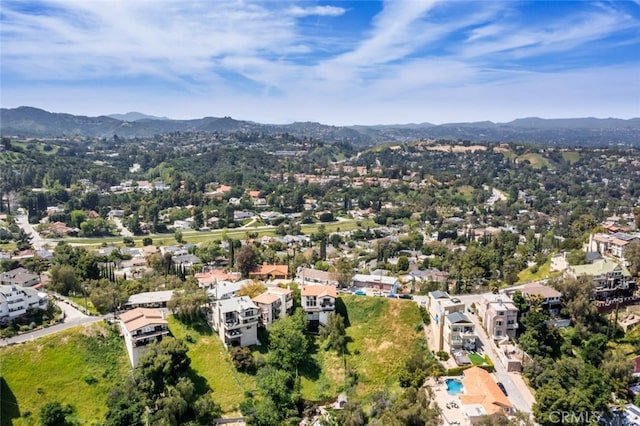 bird's eye view with a residential view and a mountain view