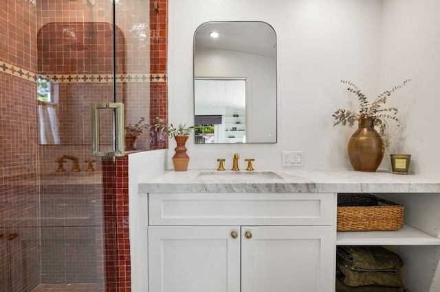 bathroom featuring vanity and walk in shower