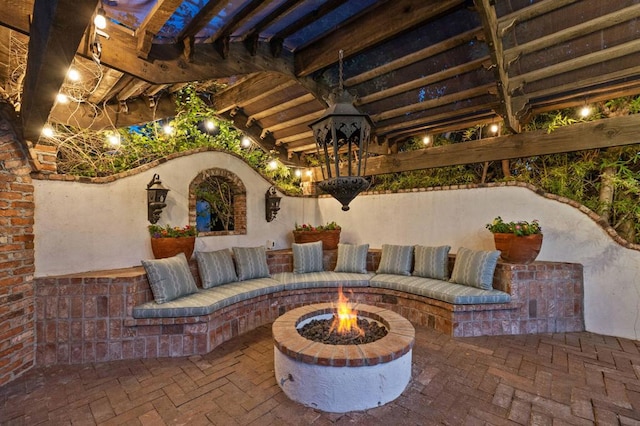 view of patio featuring an outdoor fire pit