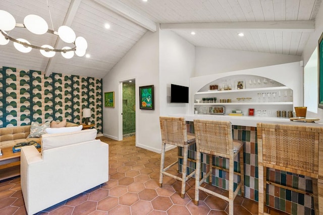 interior space with tile patterned flooring, pendant lighting, vaulted ceiling with beams, and wooden ceiling