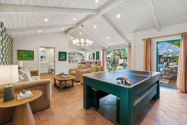 recreation room with tile patterned flooring, lofted ceiling with beams, an inviting chandelier, and wood ceiling