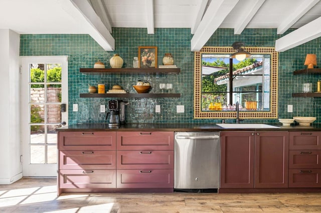 bar with dishwasher, beamed ceiling, plenty of natural light, and sink