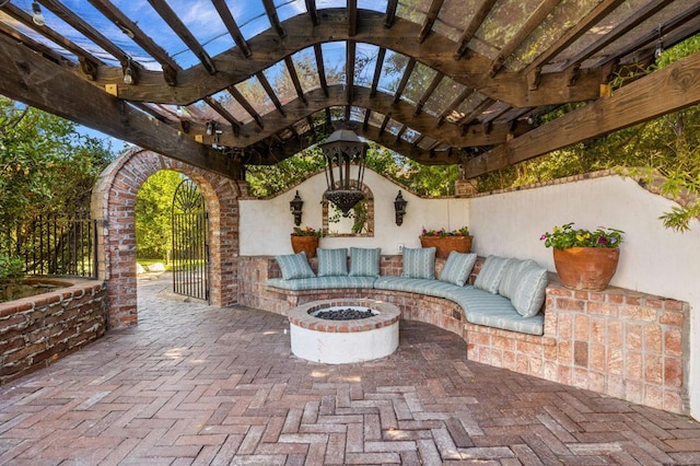 view of patio featuring an outdoor fire pit