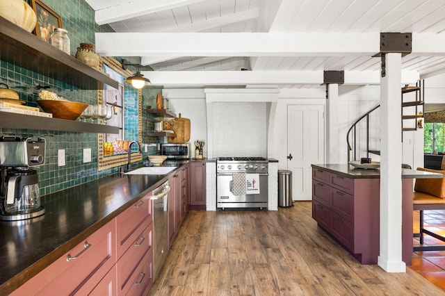 kitchen with sink, vaulted ceiling with beams, decorative backsplash, dark hardwood / wood-style flooring, and stainless steel appliances