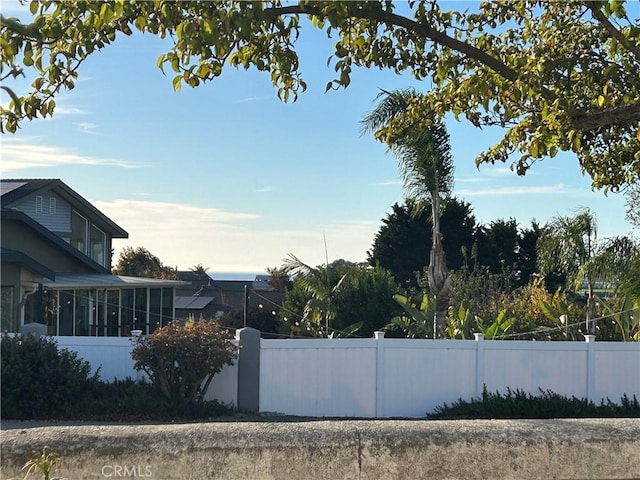 view of yard with a sunroom