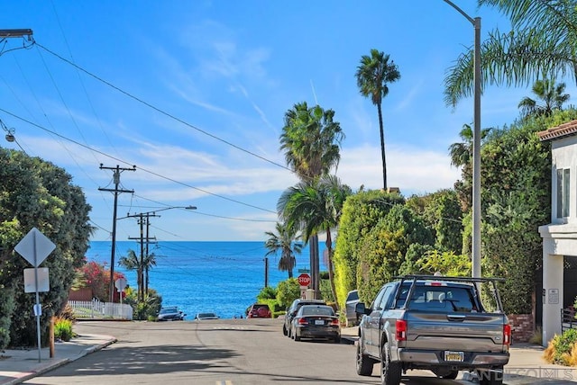 view of street with a water view