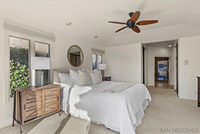 carpeted bedroom with ceiling fan