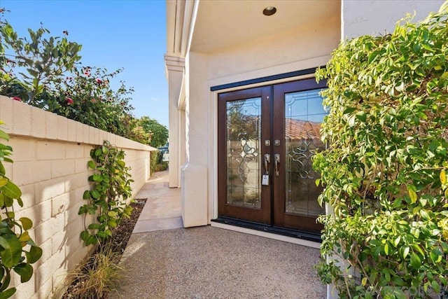 entrance to property featuring french doors