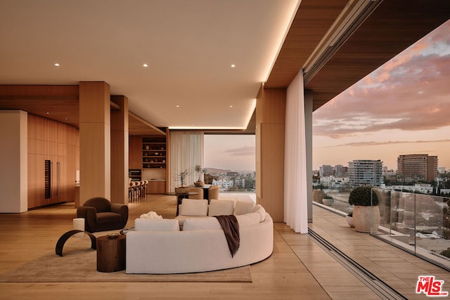 living room with light hardwood / wood-style flooring