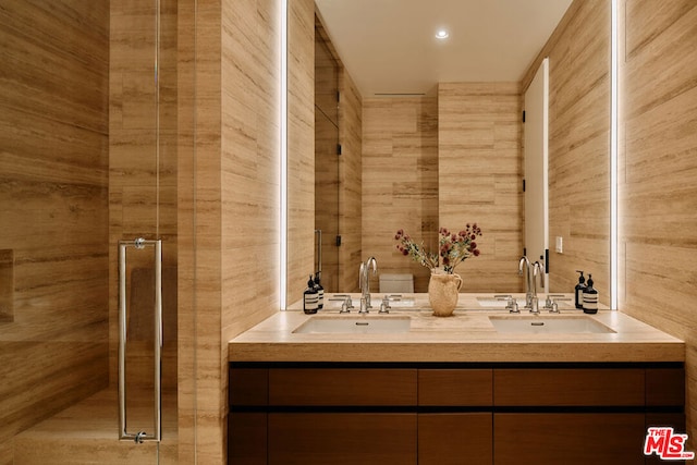 bathroom with vanity and an enclosed shower