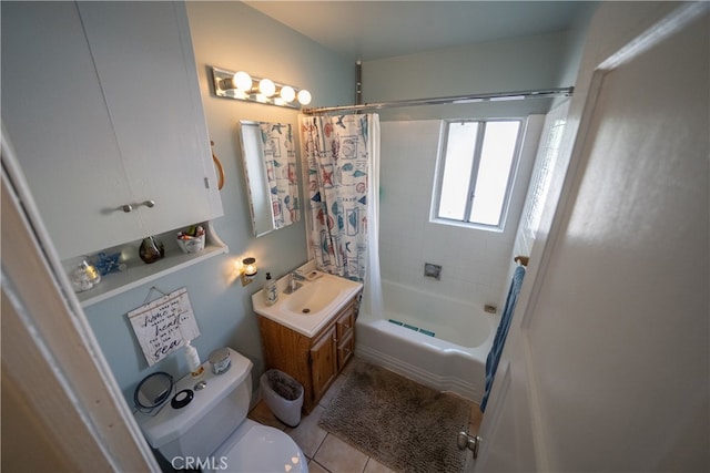 full bathroom featuring toilet, shower / bath combo with shower curtain, vanity, and tile patterned flooring