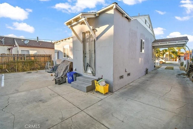 back of property with a patio area