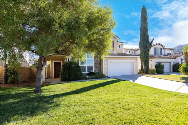 view of front of home with a garage and a front lawn