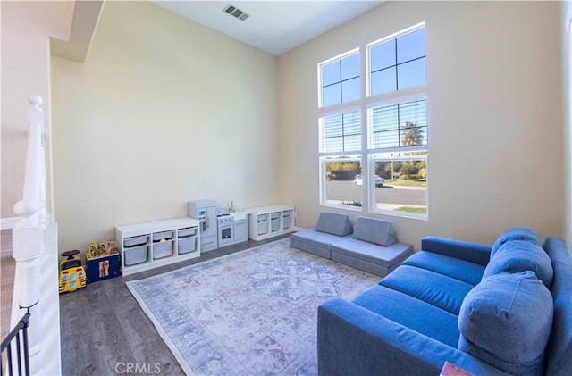 living room with dark hardwood / wood-style floors