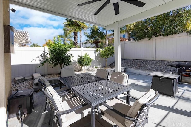 view of patio featuring ceiling fan and area for grilling