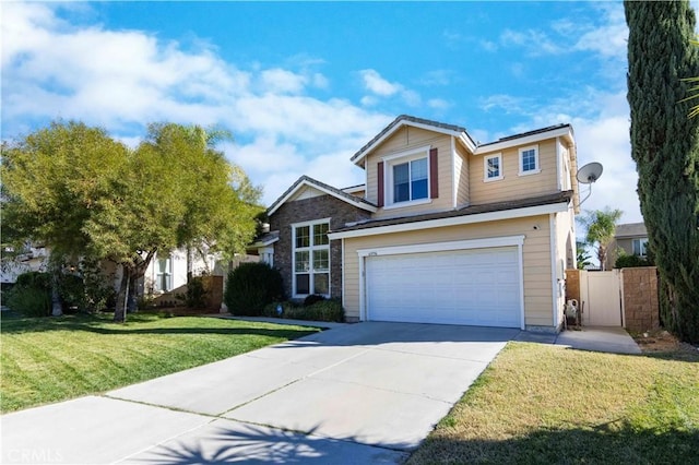 view of front of home featuring a front lawn and a garage