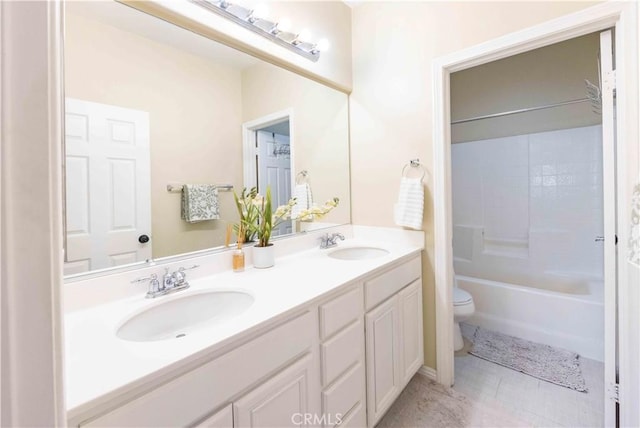 full bathroom with vanity, shower / bath combination, and toilet