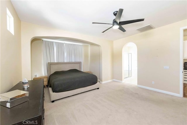 carpeted bedroom featuring ceiling fan