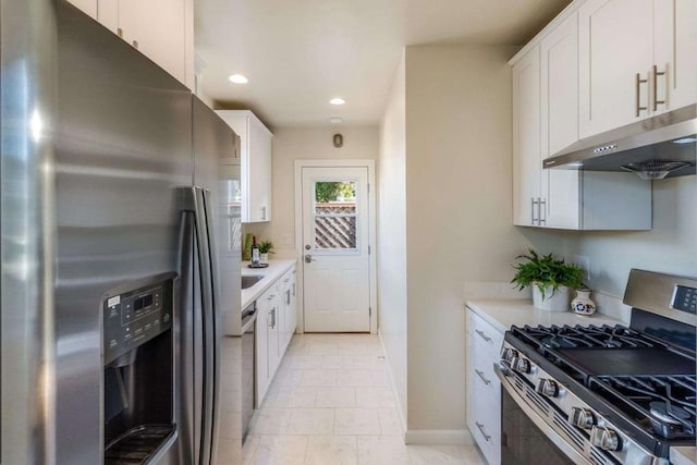 kitchen featuring white cabinets and stainless steel appliances