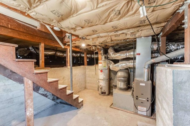 basement with strapped water heater