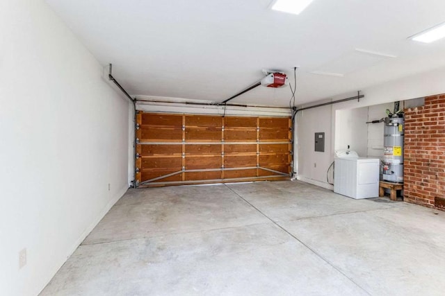 garage featuring washer / clothes dryer, water heater, electric panel, and a garage door opener