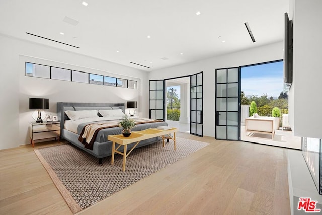 bedroom featuring light hardwood / wood-style floors