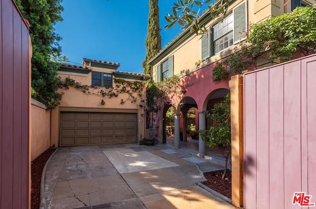 view of front of property with a garage