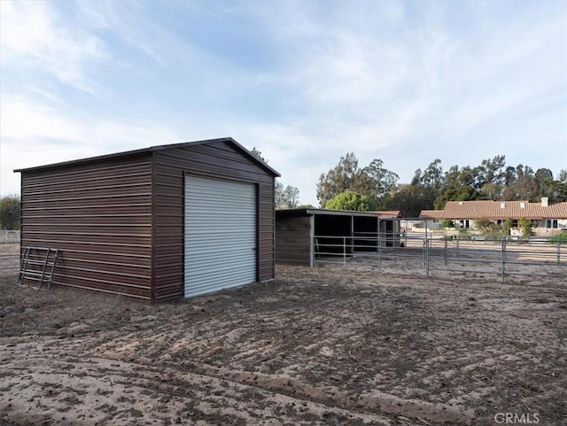 view of outbuilding featuring a garage