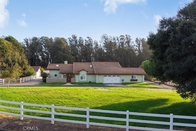 ranch-style home with a front yard