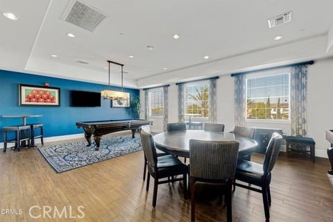 dining area featuring pool table and hardwood / wood-style flooring