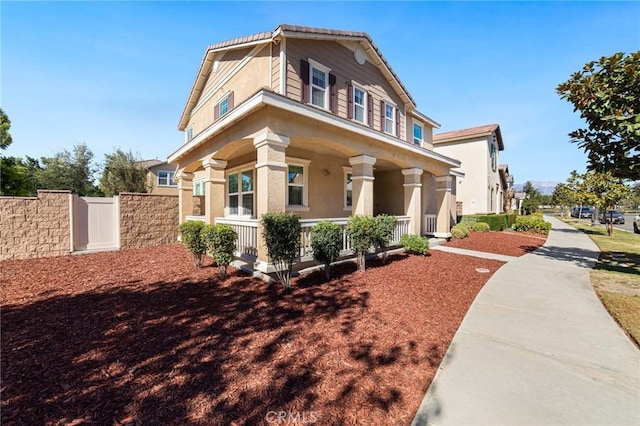 view of front of property featuring covered porch