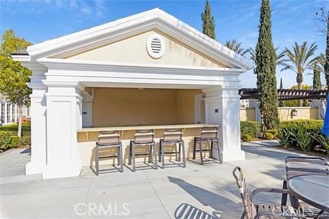 view of patio / terrace with exterior bar