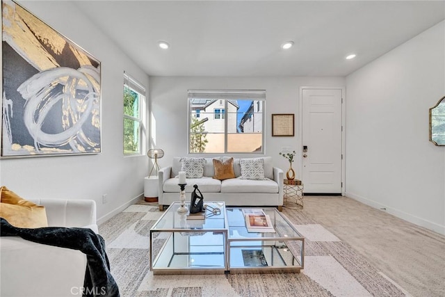 living room featuring light carpet