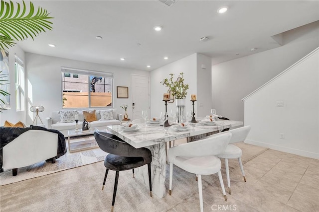 dining room featuring light tile patterned floors