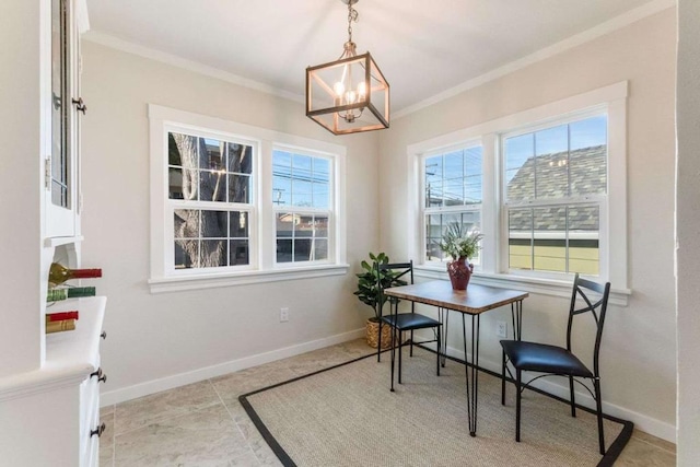 home office with ornamental molding and a notable chandelier