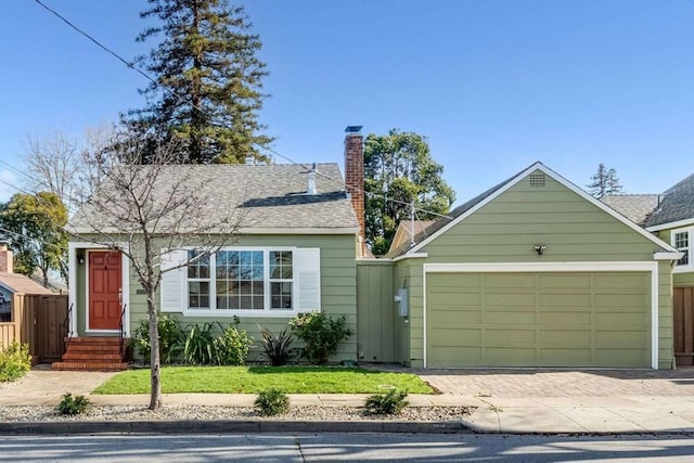 view of front of property with a garage