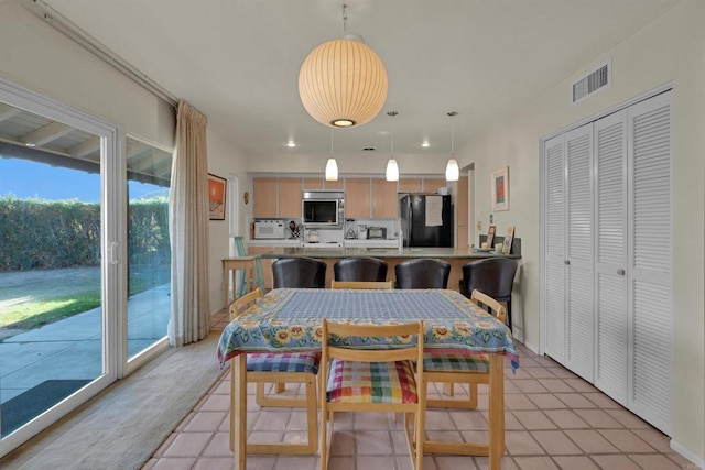 view of carpeted dining room