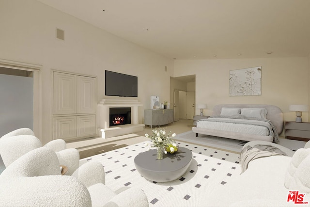 living room featuring high vaulted ceiling